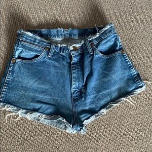 High waisted, distressed denim shorts
